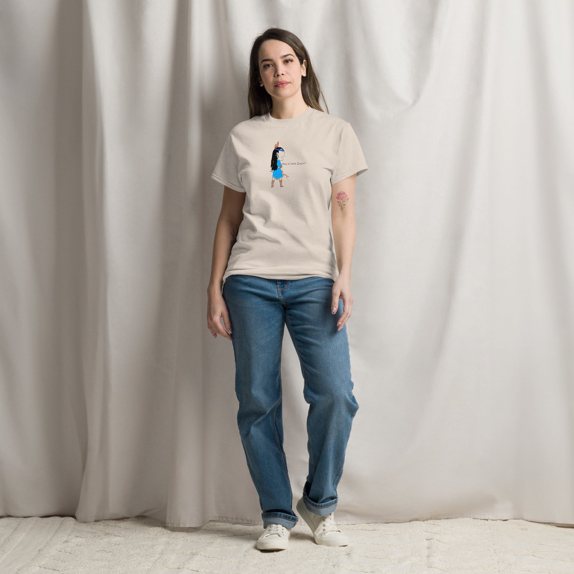Front view of a lady model wearing a beige t-shirt with an American Indian woman graphic design on a beige background