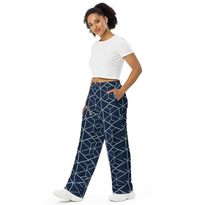 Woman wearing navy pants with white geometric pattern and a 'Fun Wear Code' text logo on a white background