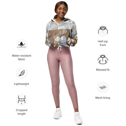Woman wearing a patterned windbreaker and pink leggings with feature icons on a white background