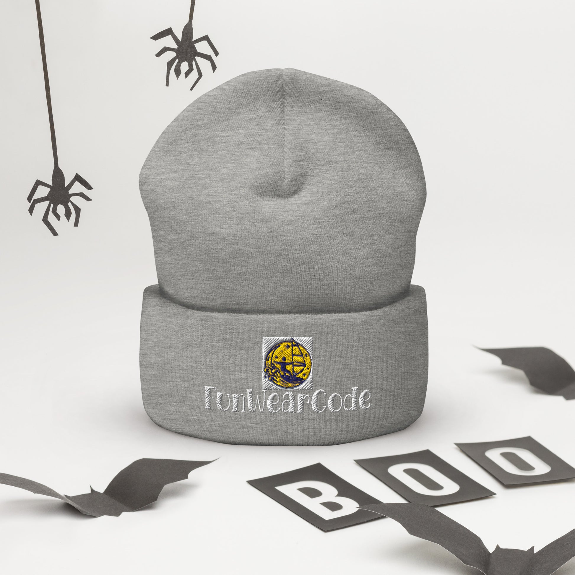 Gray beanie with FunWeardCode logo on a Halloween-themed background with spiders and 'BOO' letters.
