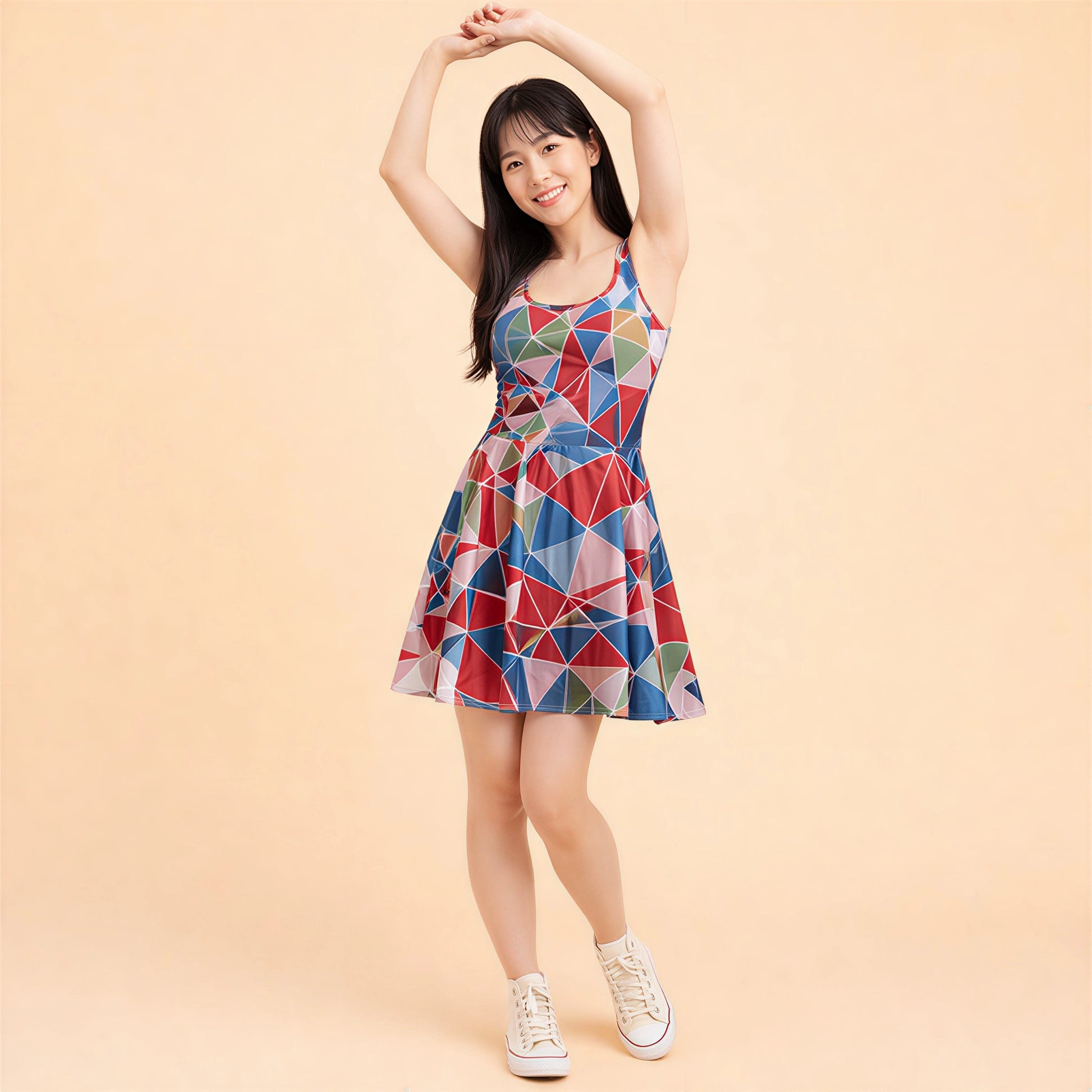 Woman wearing a colorful geometric patterned dress on a beige background